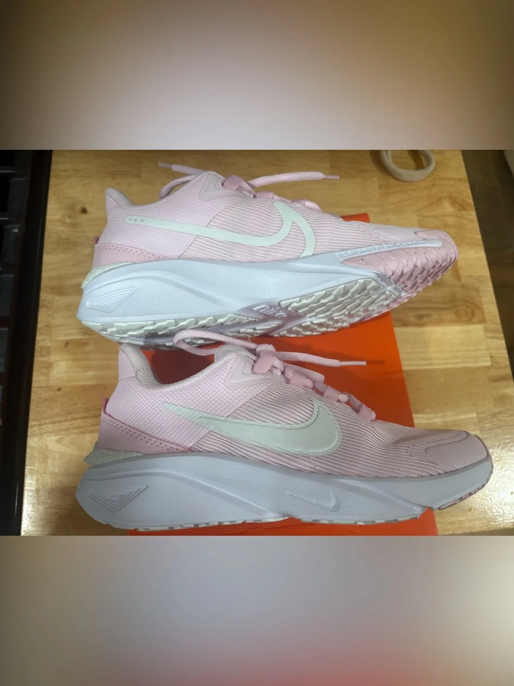 Athletic comfy breathable Nike Pink Running Shoe with White logo.